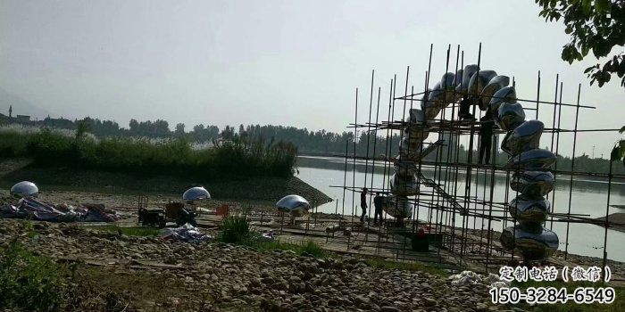 鵝卵石大門雕塑，公園美陳雕塑，不銹鋼鏡面拱門雕塑