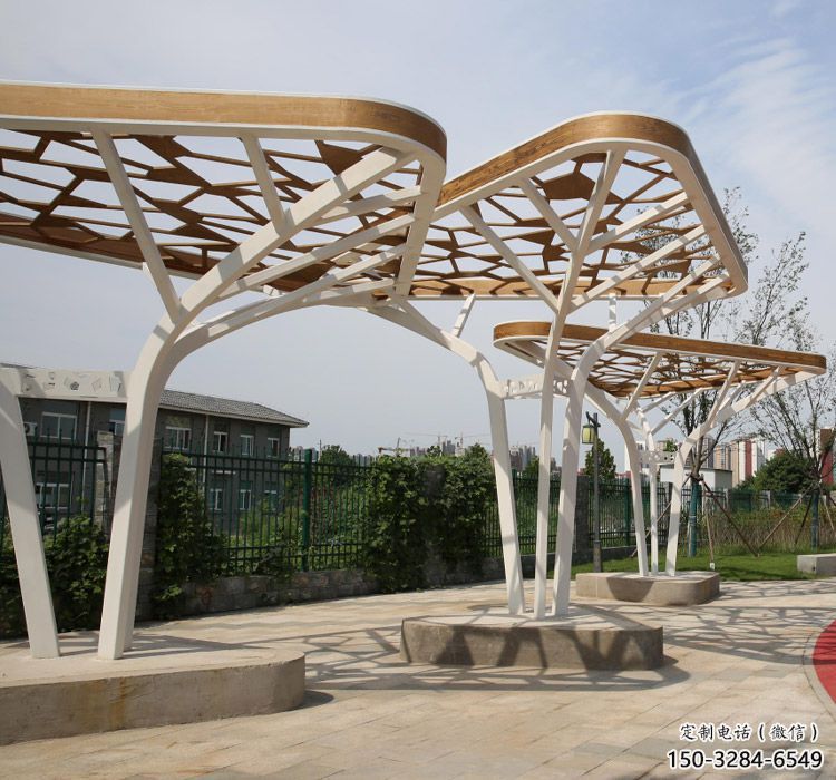 鏤空不銹鋼大樹(shù)葉廊架雕塑