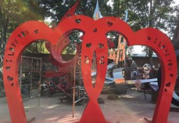 展示雕塑定制，小區(qū)雕塑，不銹鋼心心相印雕塑提供